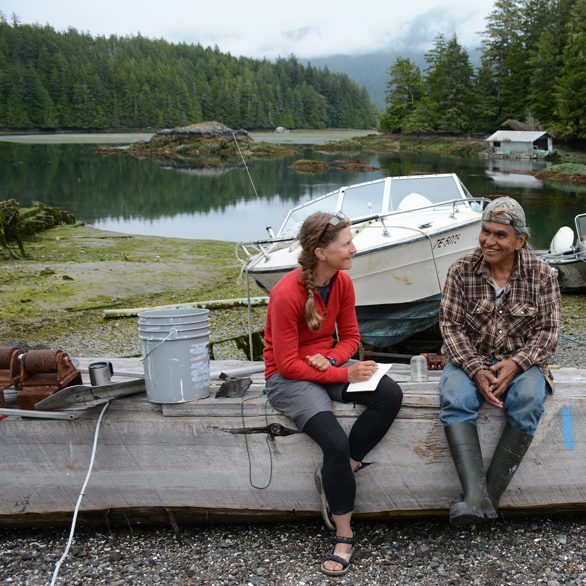 Carl Martin and Jacqueline Windh talking about dugout canoes.
