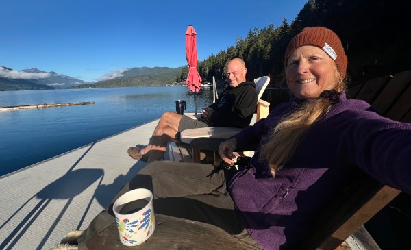 Coffee on the dock at Sproat Lake Vacation Rental Lakefront Home Cabin